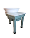 The new Kiln Crafts Daisy pottery wheel in sage green with a white wipe-clean top and splash pan