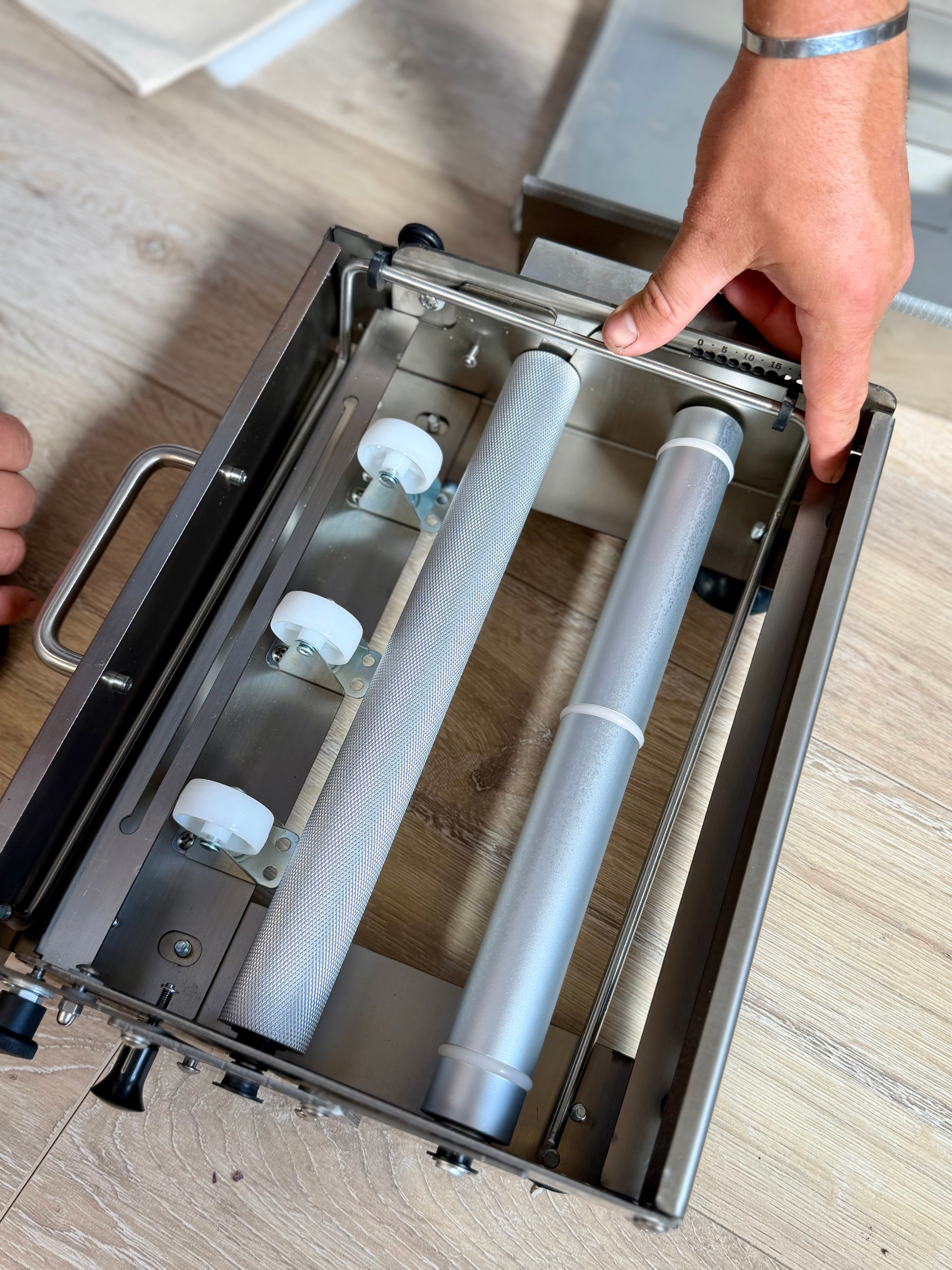 Table Top Clay Roller case opened showing the roller mechanism
