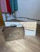 Side view of the Table Top Clay Roller with rolling board and canvas