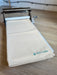 Table Top Clay Roller with canvas cloth feeding through the rollers