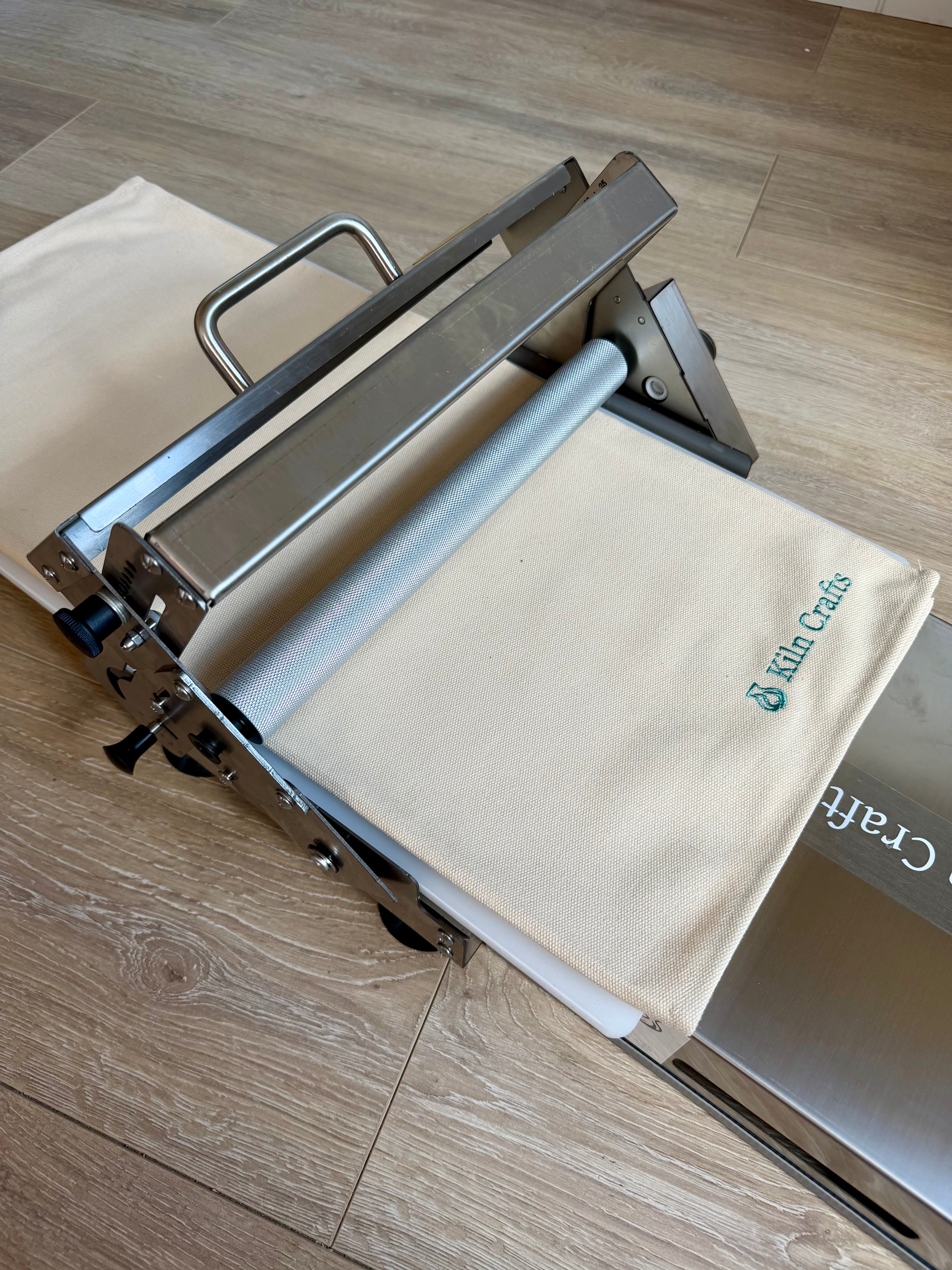 Unfolding the Table Top Clay Roller for setup