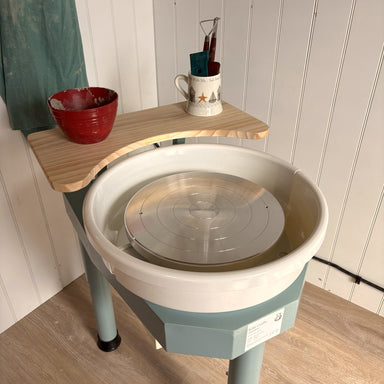 Kiln Crafts Daisy Wheel Shelf mounted to Daisy wheel — rear view showing bracket and finish