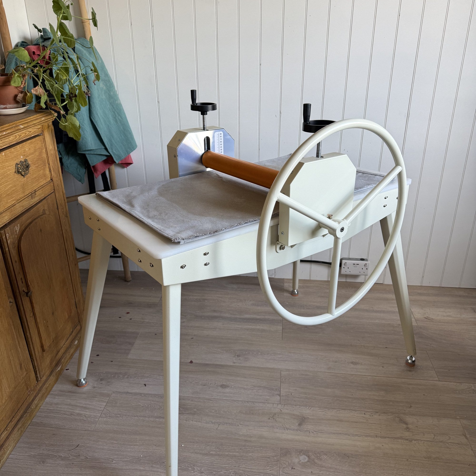 Large hand wheel on the Kiln Crafts Clay Roller slab roller